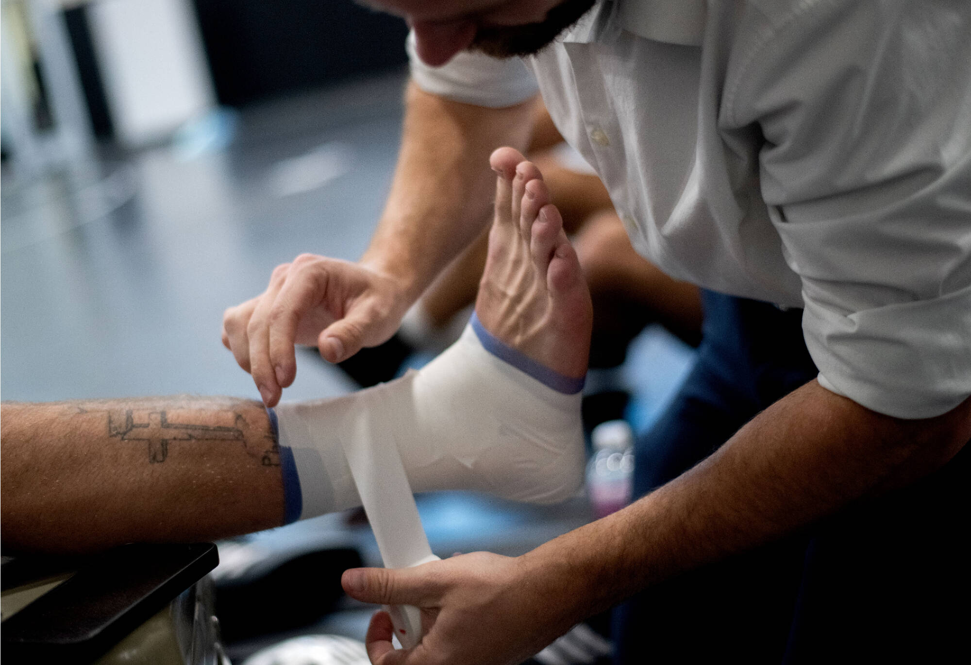 Someone wrapping foot